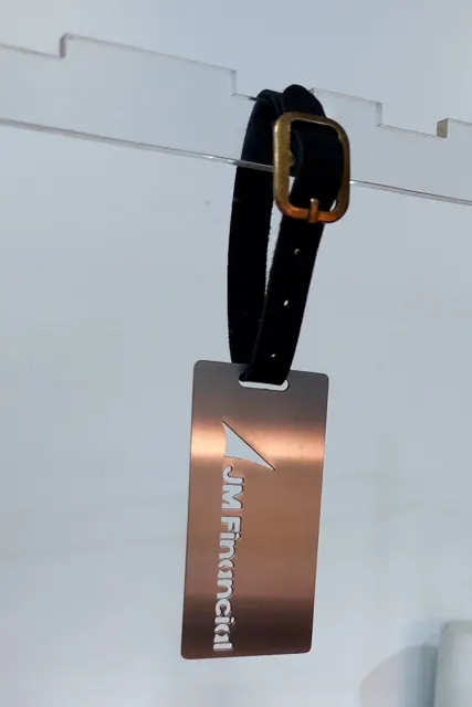 Steel luggage tag with JM Financial logo
