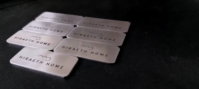 Hiraeth Home steel labels at an angle
