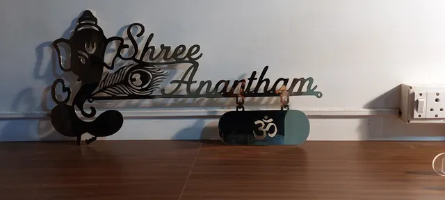 Laser-cut black steel house nameplate