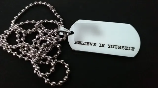 Dog tag engraved Believe in yourself with personal details hidden