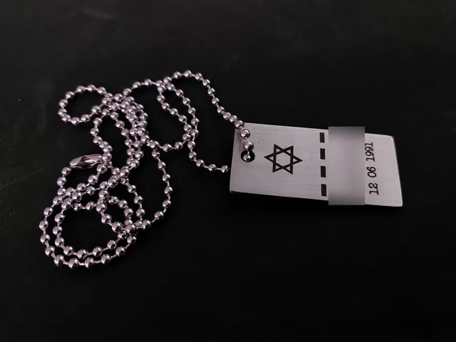 Rectangular dog tag with a Star of David and Hebrew text