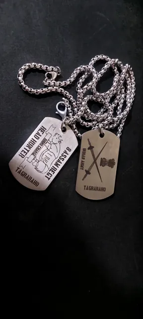 Indian Army unit dog tags engraved with a Head Hunter emblem and crossed swords