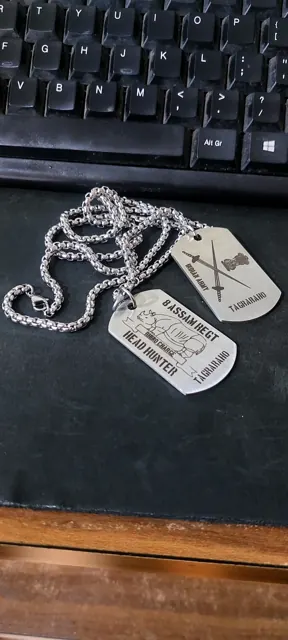 Indian Army unit dog tag pair photographed on a desk