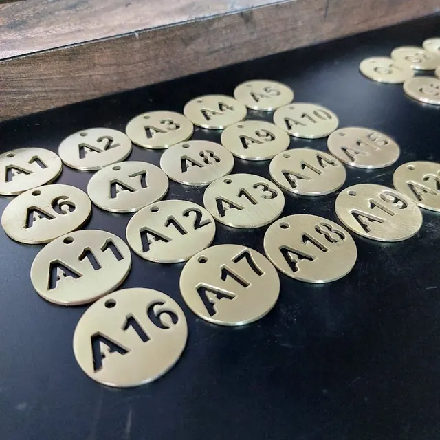 Brass numbered tags A1 to A20
